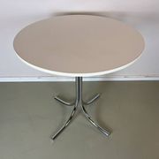 Vintage round white chrome dining table from the 70s.