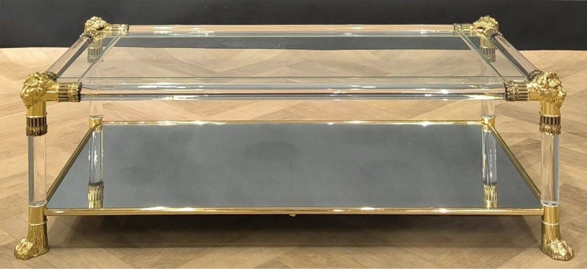 Plexiglass coffee table in Hollywood Regency style