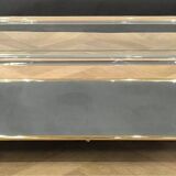 Plexiglass coffee table in Hollywood Regency style