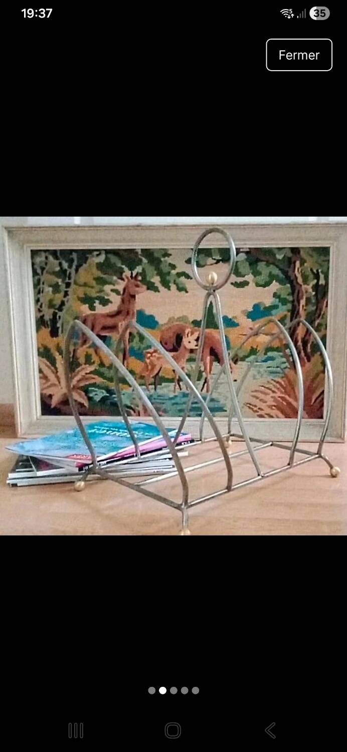 Vintage magazine rack with brass legs