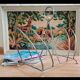 Vintage magazine rack with brass legs