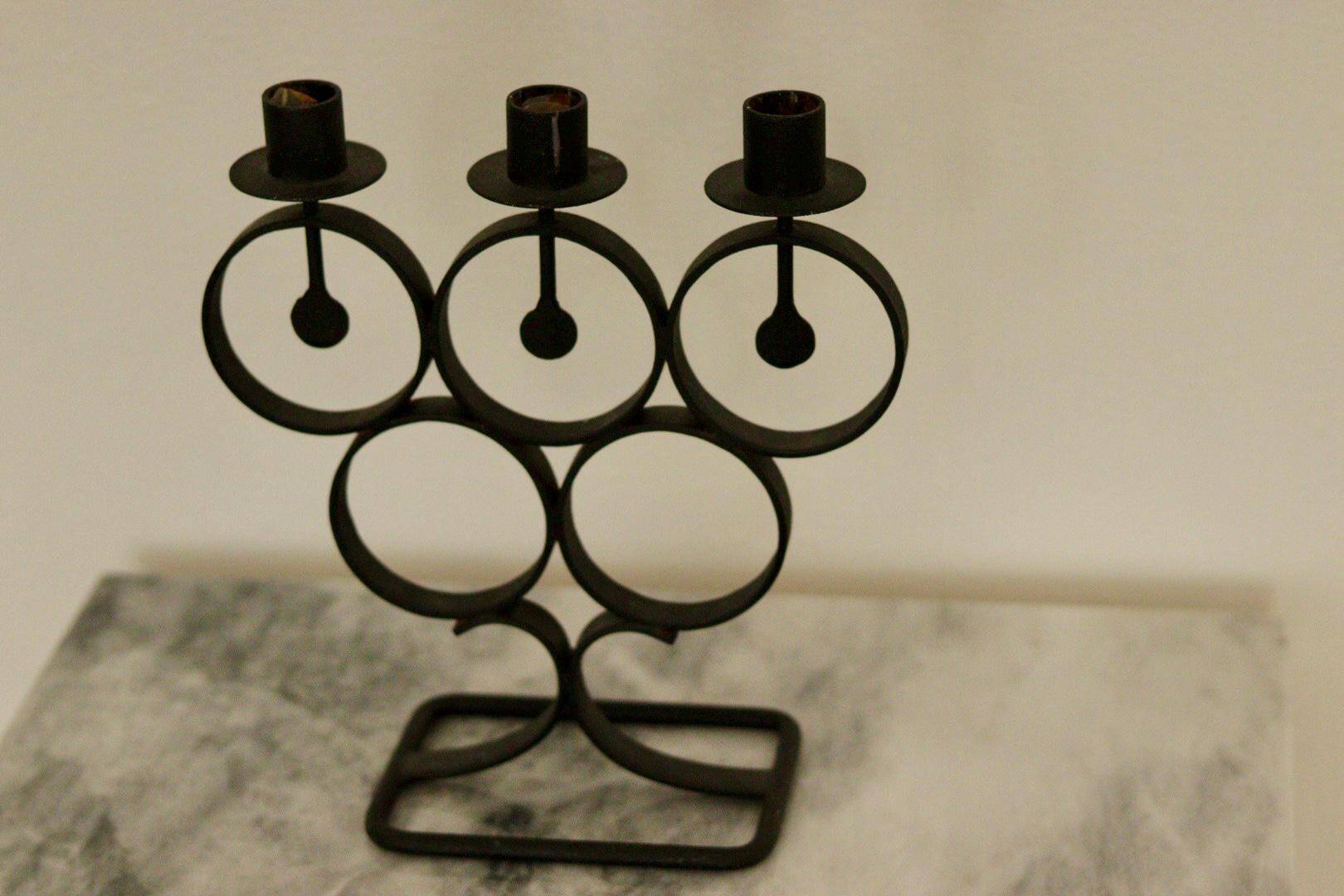 Vintage metal candelabrum with black coating