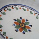 Shallow flat dish in Nevers earthenware from the 18th century.