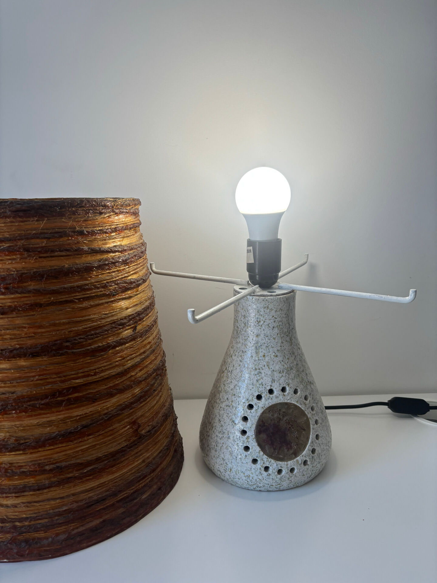 Accolay Lamp, the base in glazed ceramic with openwork decoration.
