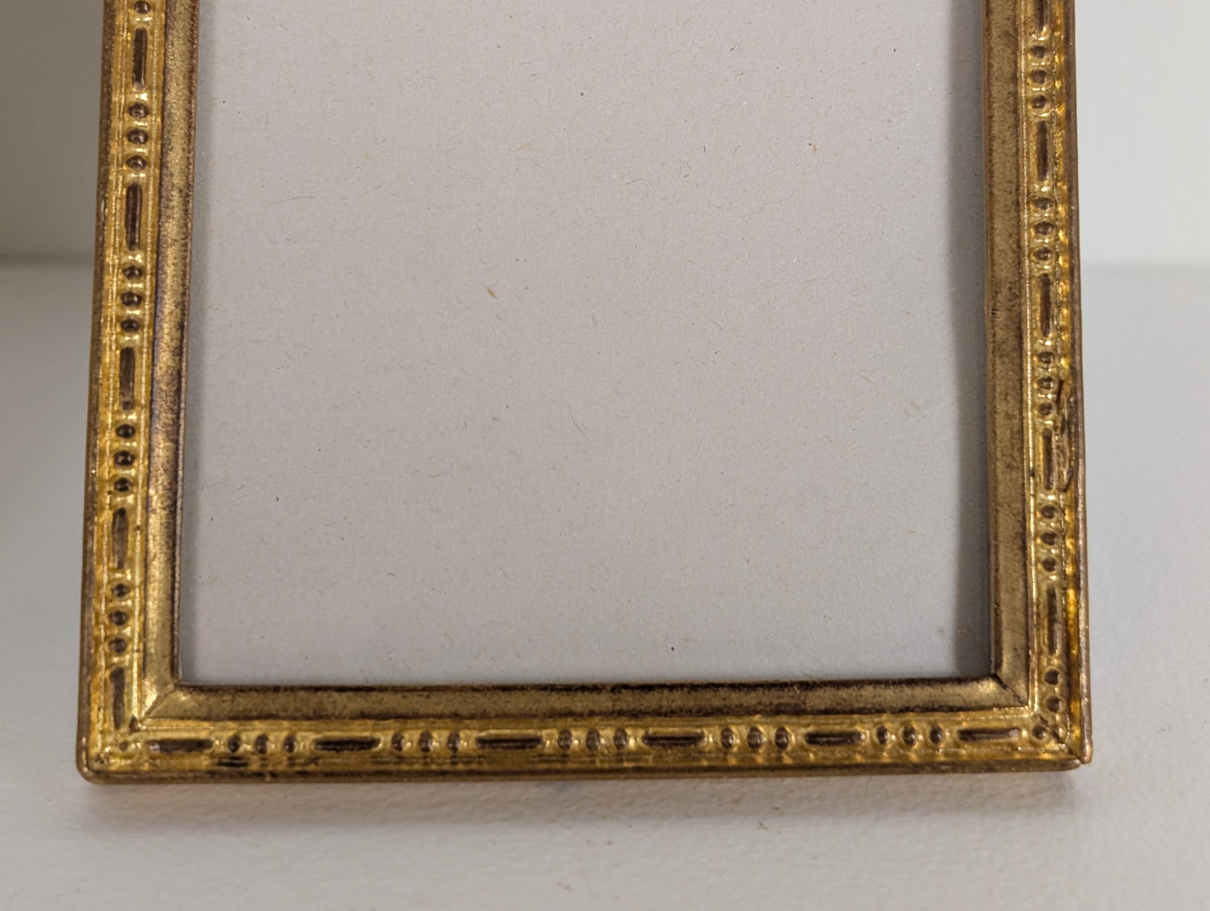 Pair of gilt bronze photo frames