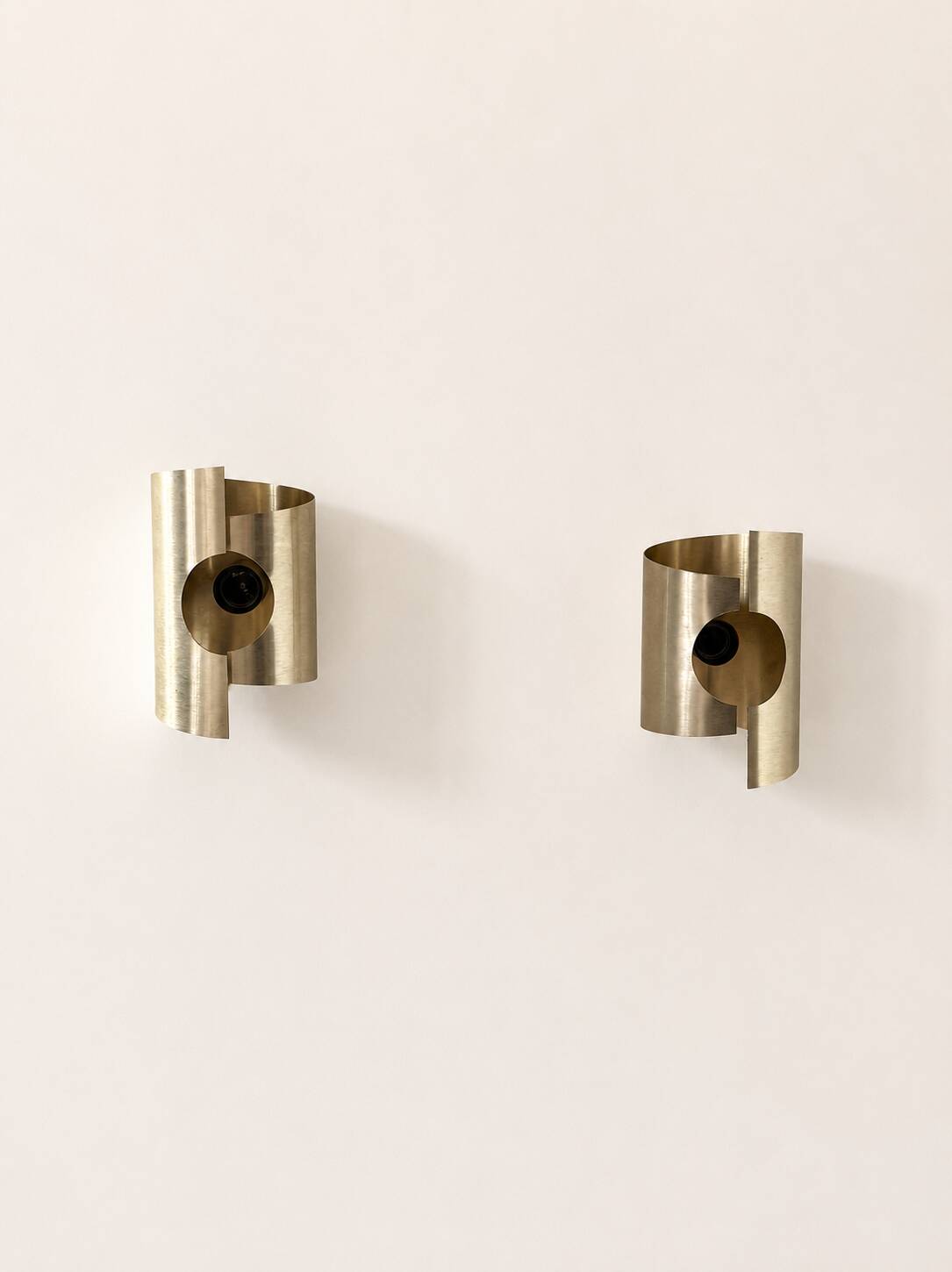 Pair of vintage wall sconces in brushed metal with a slight gold finish, France 1970.