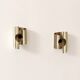 Pair of vintage wall sconces in brushed metal with a slight gold finish, France 1970.