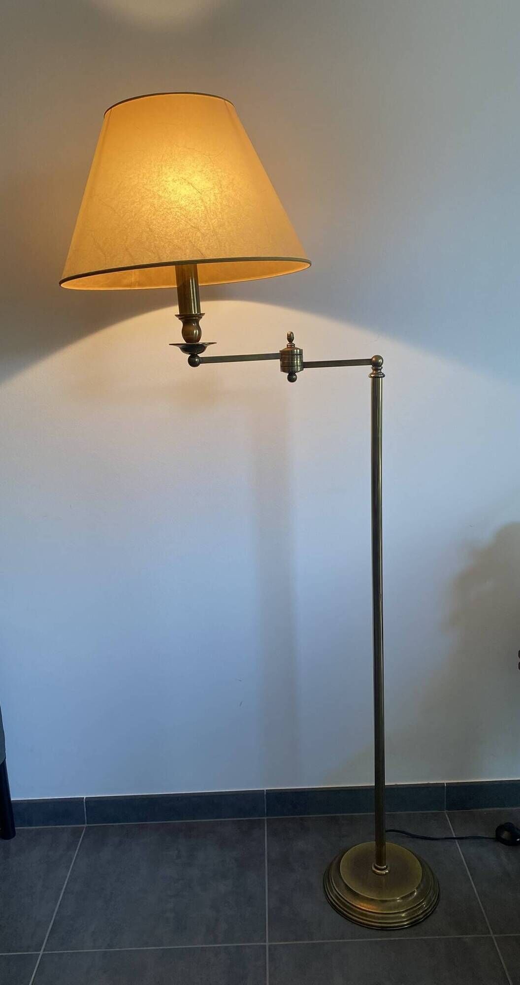 Reading lamp, floor lamp, adjustable arm lamp.