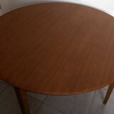 Scandinavian round teak dining table from the 60s extendable