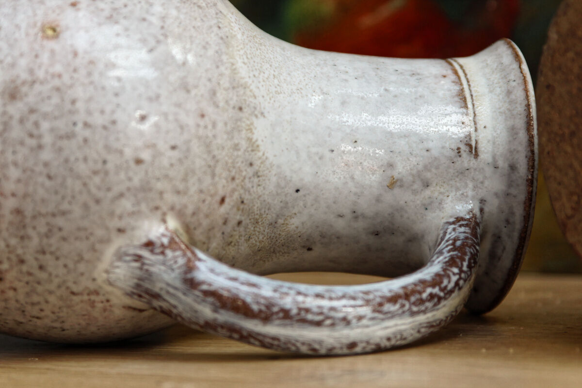 Pair of glazed terracotta pitchers