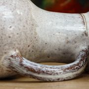 Pair of glazed terracotta pitchers