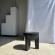 Black mango wood tripod side table with a semi-spherical top, height: 45 cm, diameter: 44 cm.
