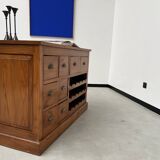 Two-sided paneled counter, bottle storage