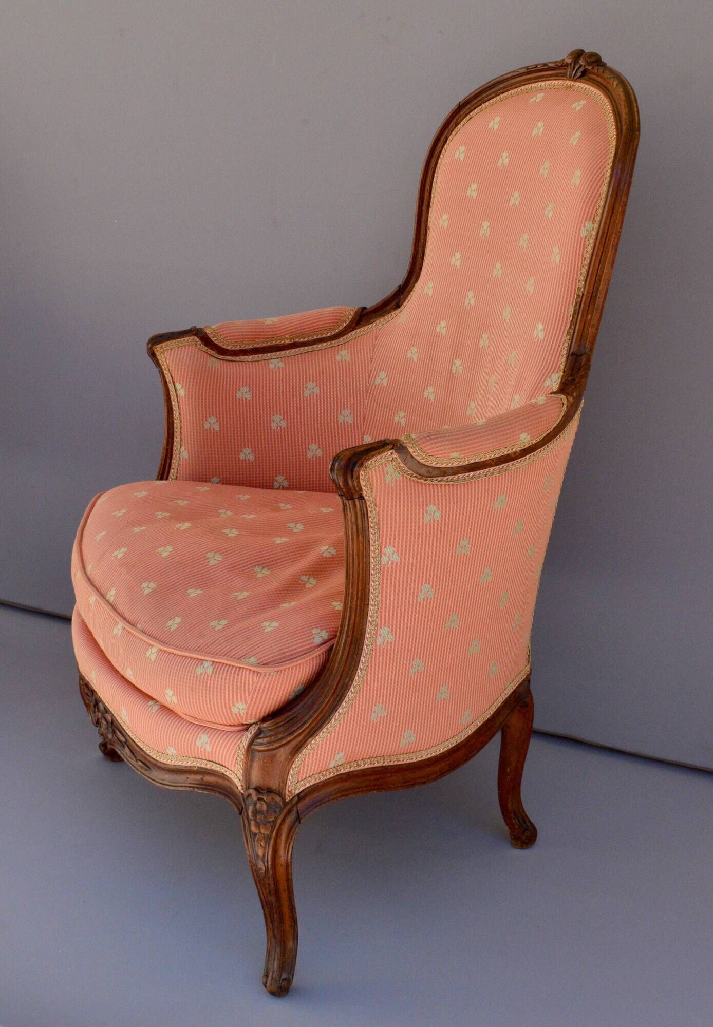 Pair of Louis XV period bergeres in walnut