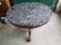 Round pedestal table with marble top and mahogany tripod from the 19th century