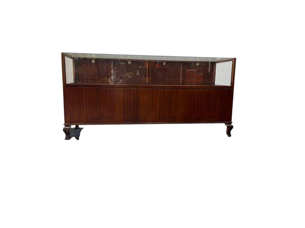 Vintage wooden shop counter/display case.