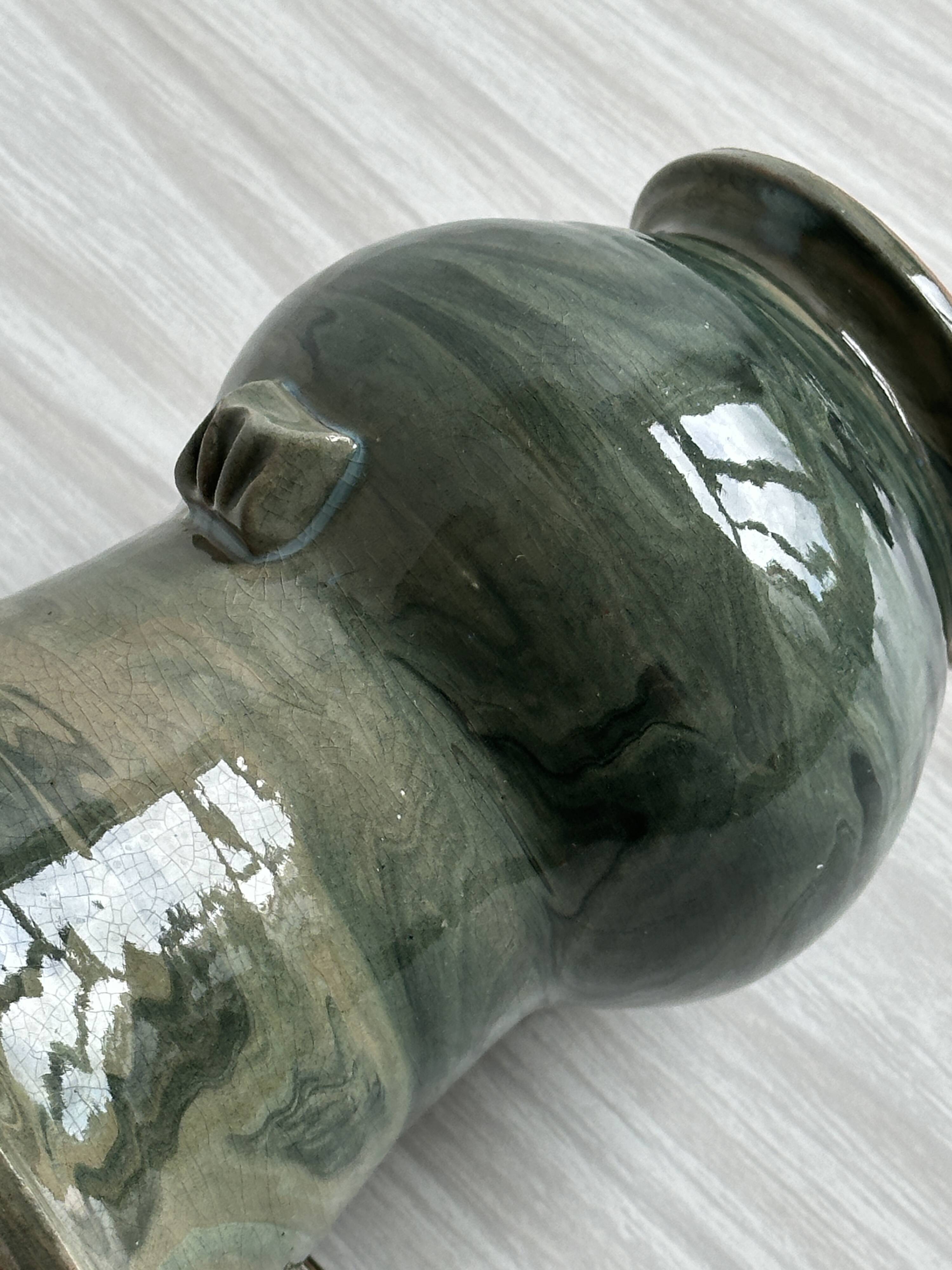 Green marbled ceramic vase