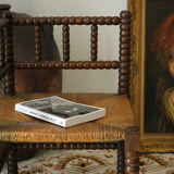 Pair of chairs corner fireplace turned beaded wood