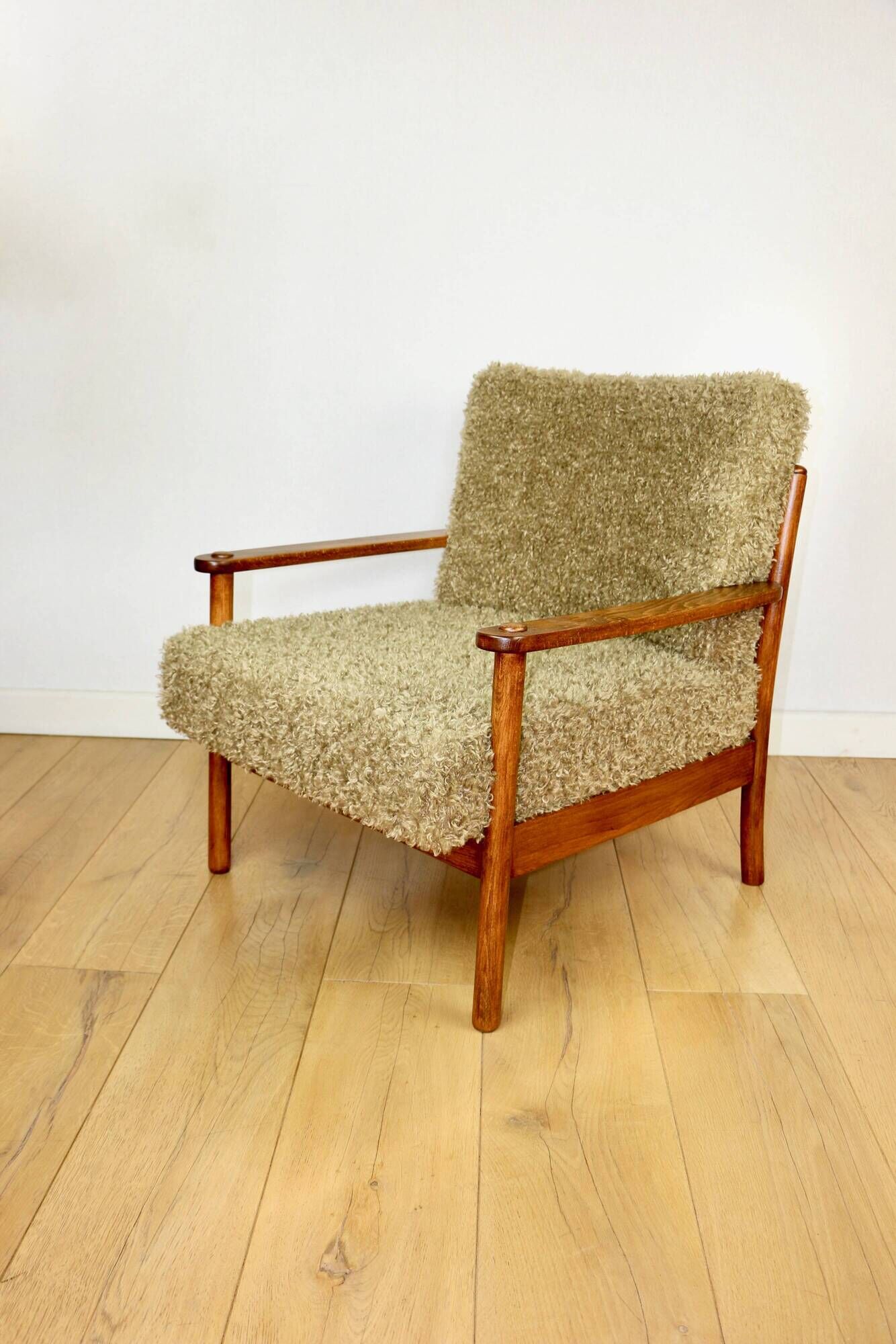 Wooden vintage brown armchair, olive green, long pile on removable cushions
