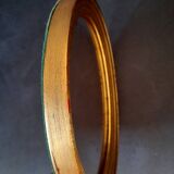 Old golden oval mirror