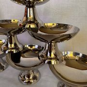 Set of 6 stainless steel ice cream bowls by Guy Degrenne with matching spoons.
