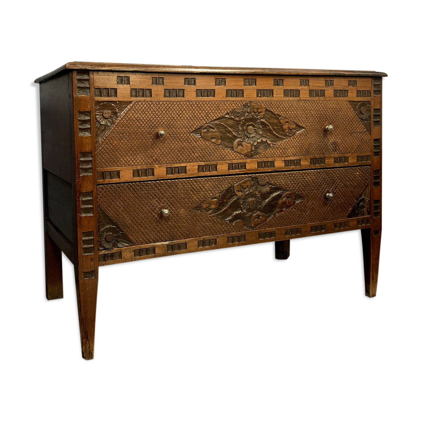 Louis XVI era jumping dresser in fully carved walnut