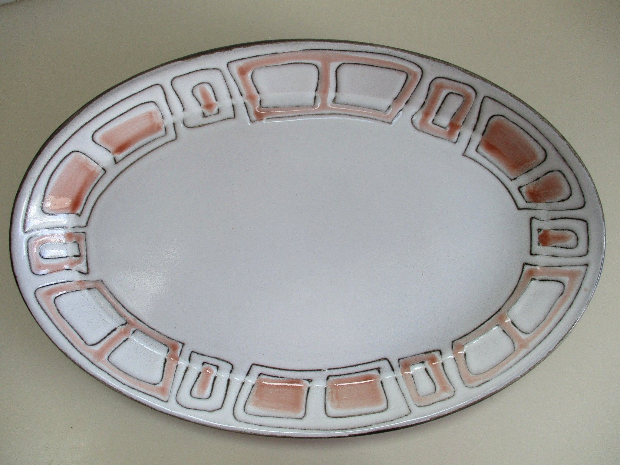 Plat de service ovale en grès de niderviller.modèle maille vintage