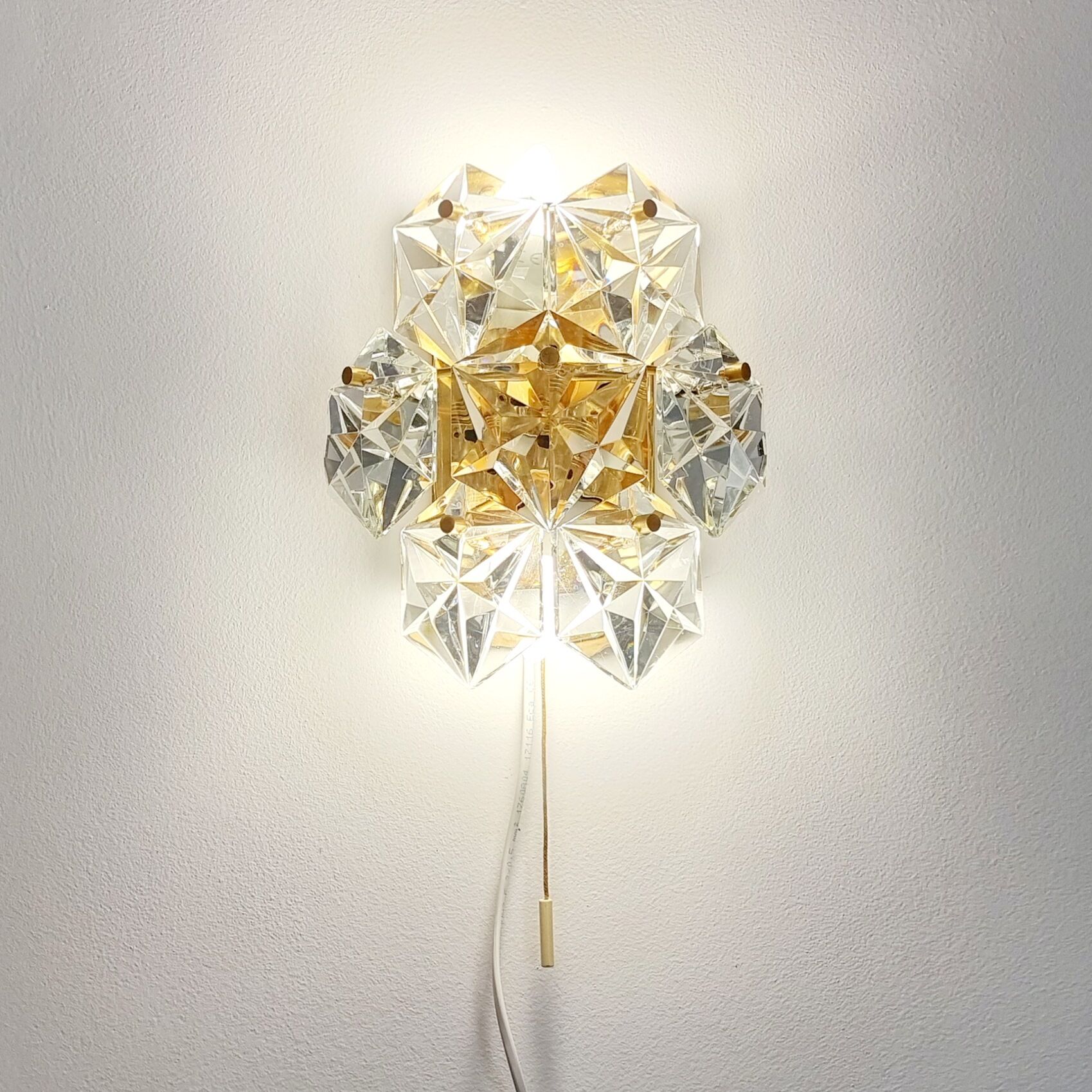 Pair of faceted crystal wall lights / sconces by Kinkeldey, Germany, 1970s