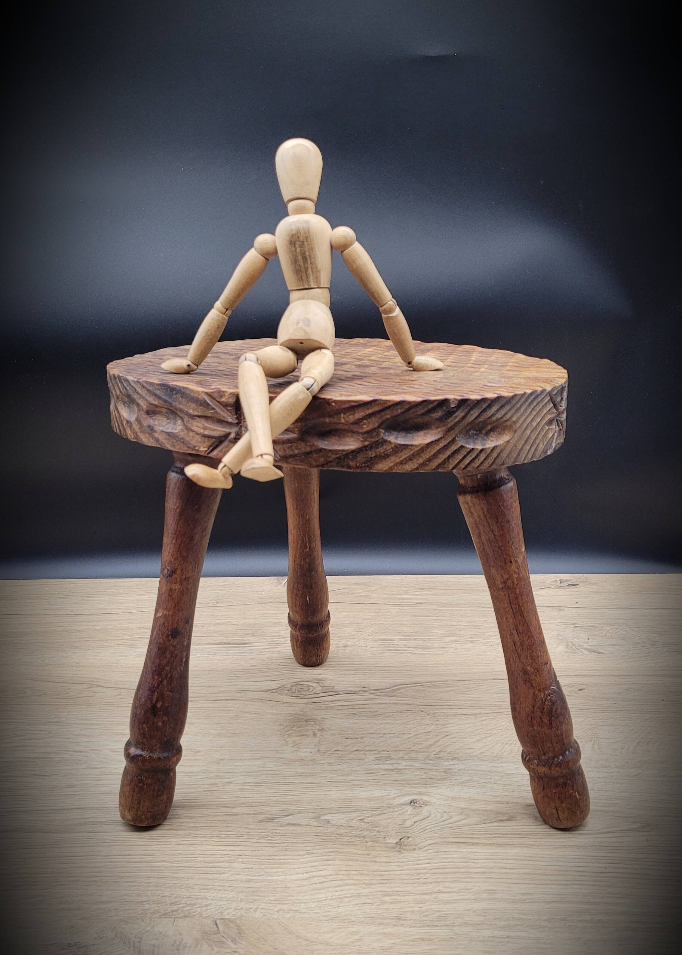 Oval tripod stool worked