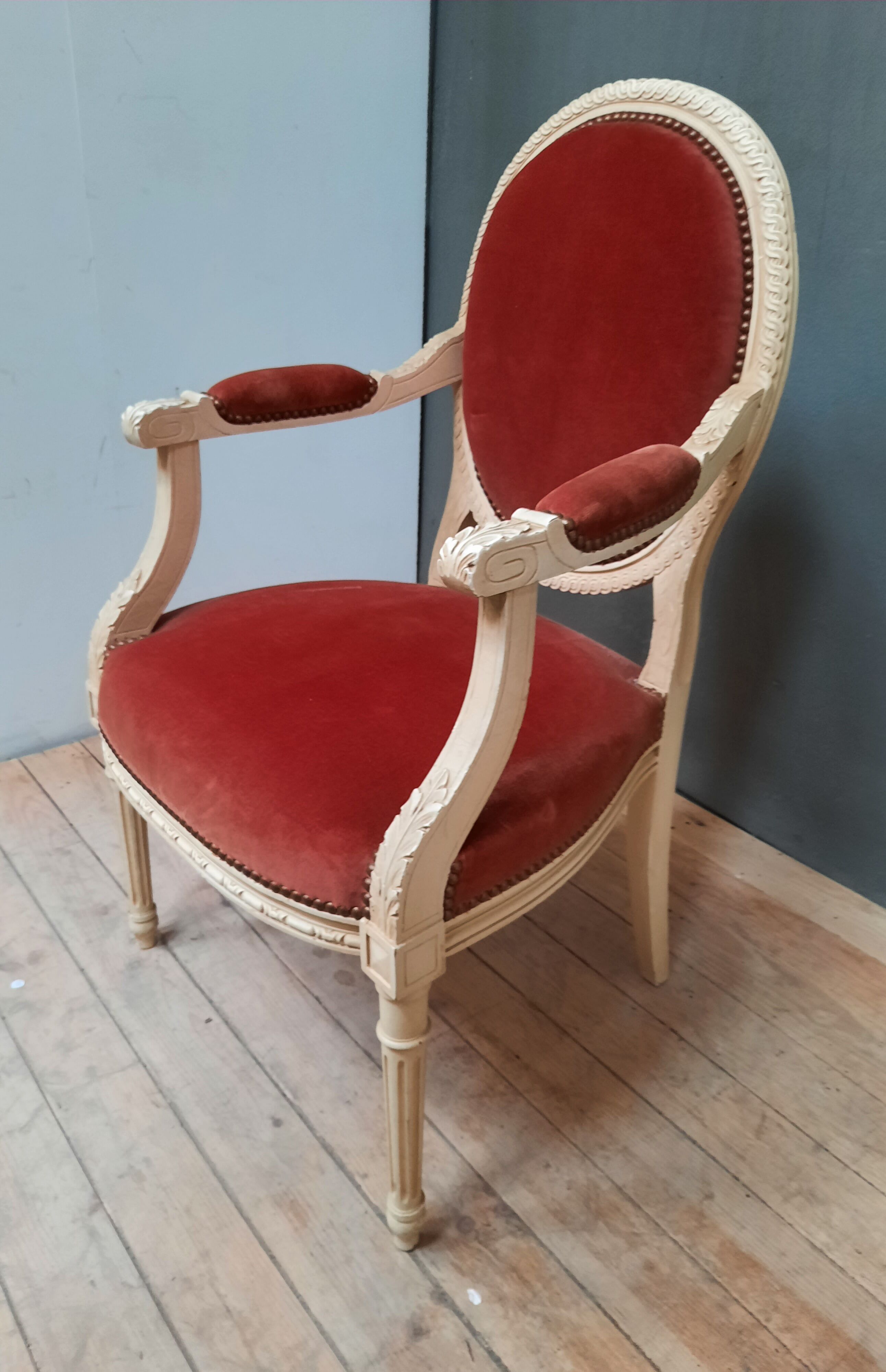 Louis XVI style armchair in white lacquered wood