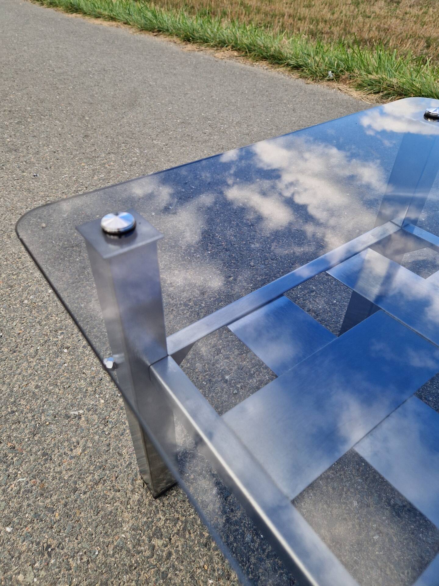 Stainless steel and smoked glass coffee table