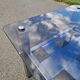 Stainless steel and smoked glass coffee table