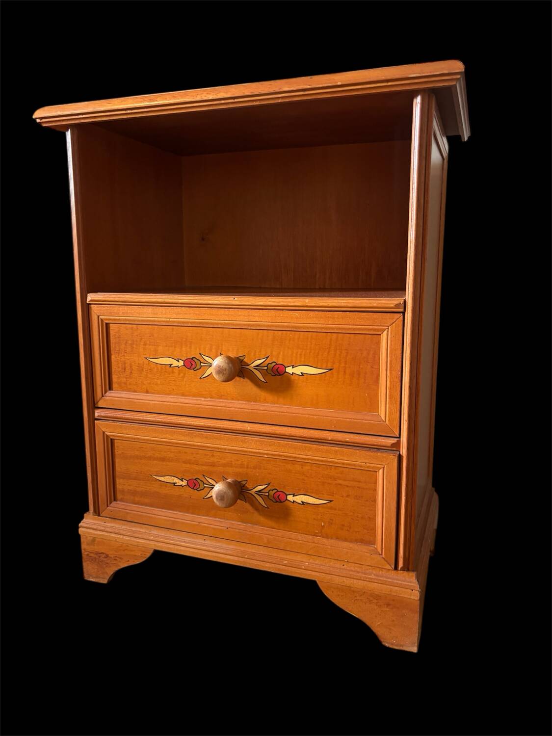 Vintage bedside table with floral decor