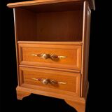 Vintage bedside table with floral decor