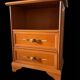 Vintage bedside table with floral decor