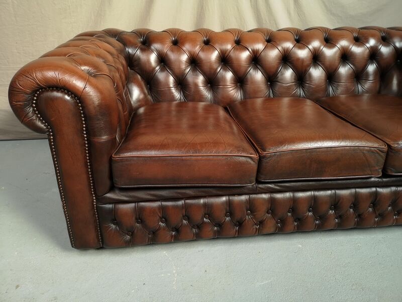 Brown leather chesterfield sofa
