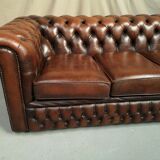 Brown leather chesterfield sofa