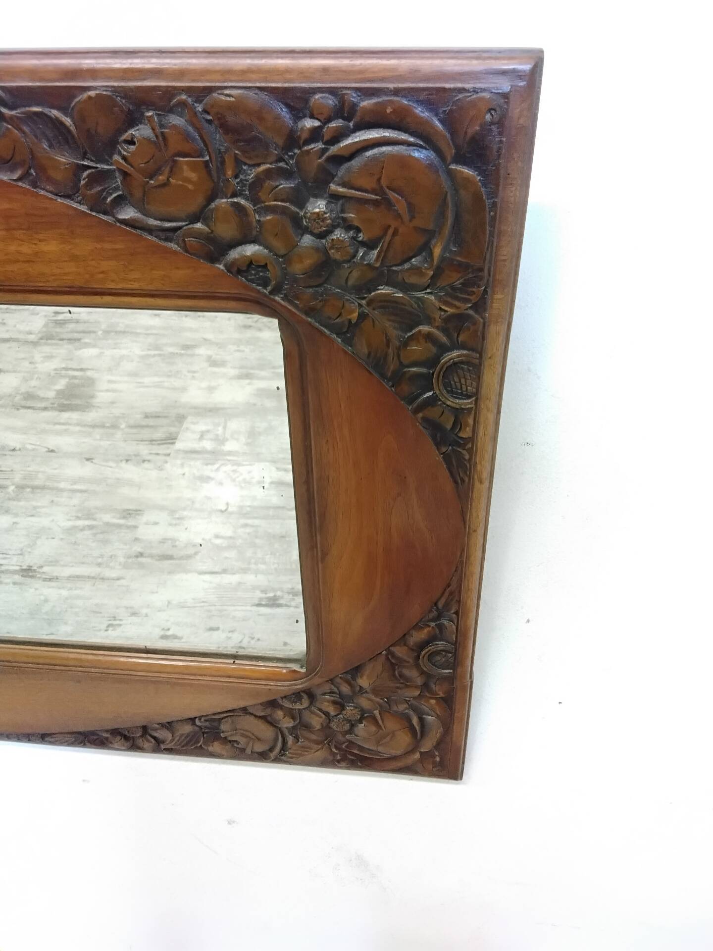 Art Deco mirror with a wooden frame