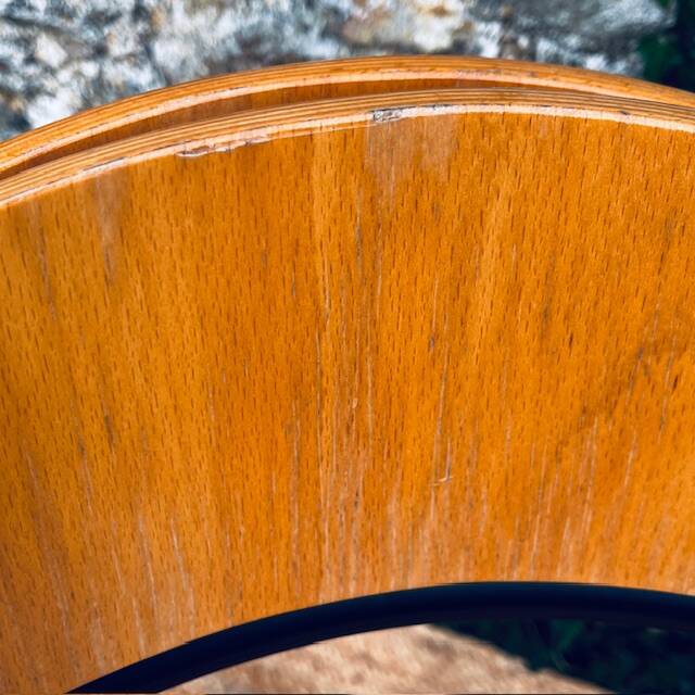 Pair of wooden and black metal chairs