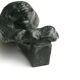 Woman bust in carved stone, 50s
