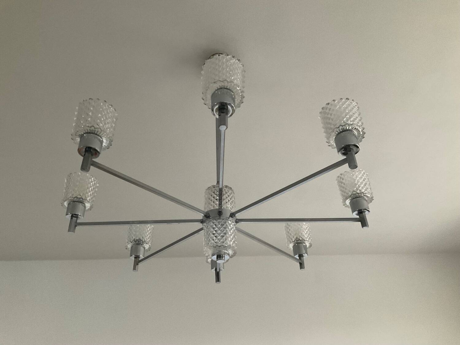 Vintage Italian chandelier from the 60s in chromed metal and glass