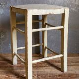 Old patinated painted wooden stool