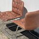 Paire de chaises en cuir par Robert Haussman