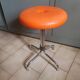 Vintage 70's rotating stool, chrome base, orange imitation leather seat
