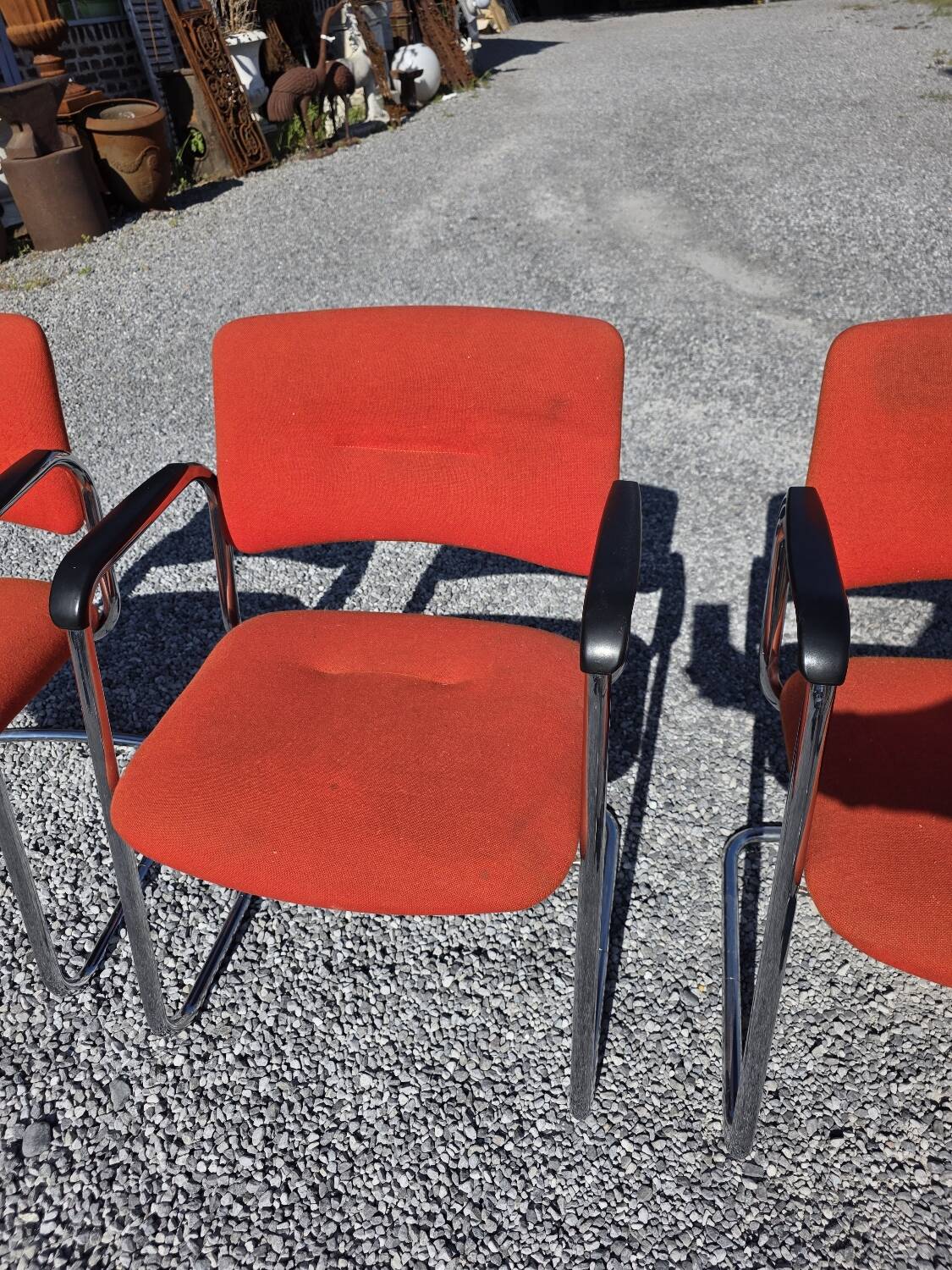 3 vintage chrome metal armchairs with orange fabric tops