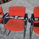 3 vintage chrome metal armchairs with orange fabric tops