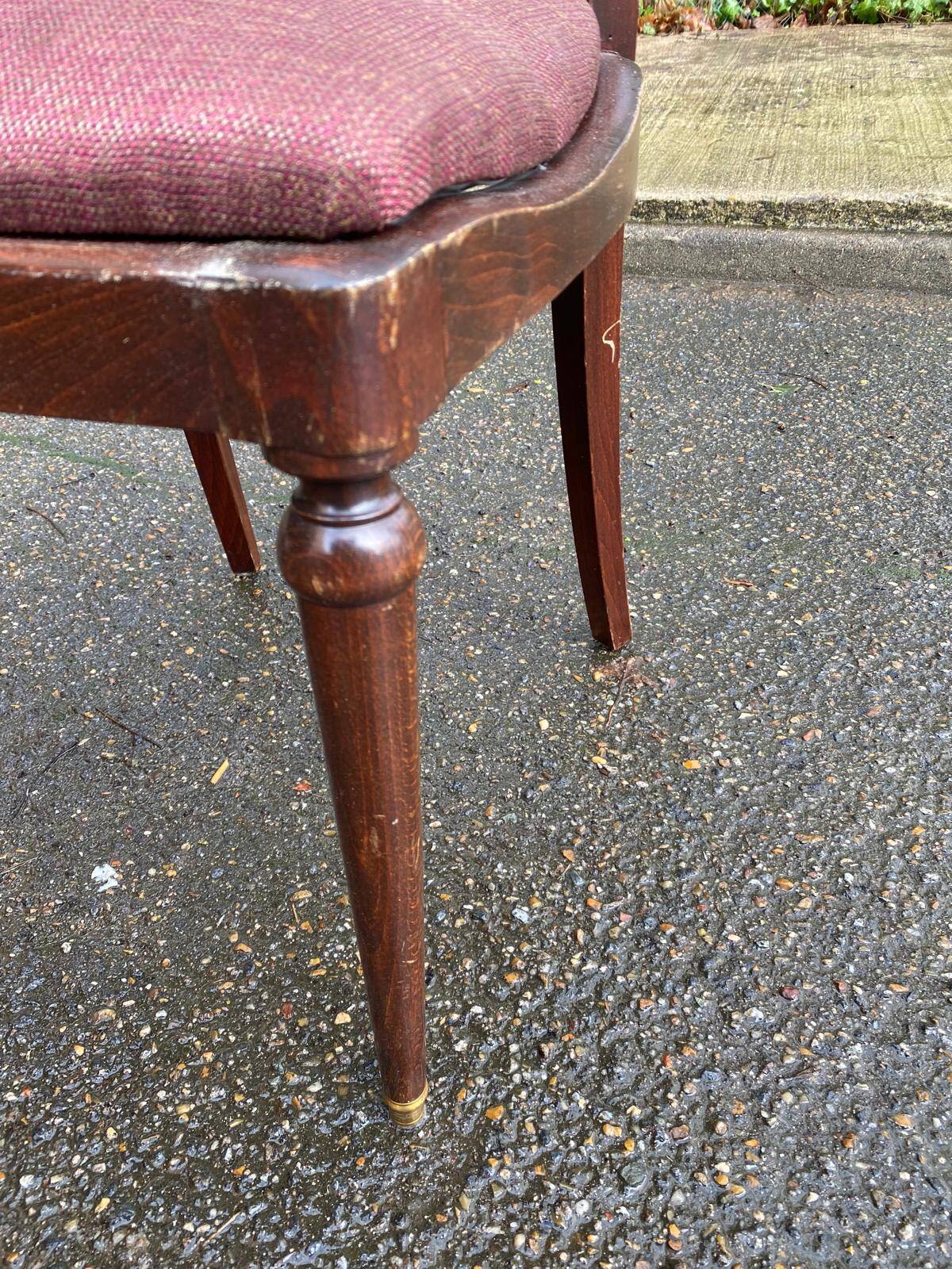 Mahogany chair in English style with burgundy fabric from the 20th century.