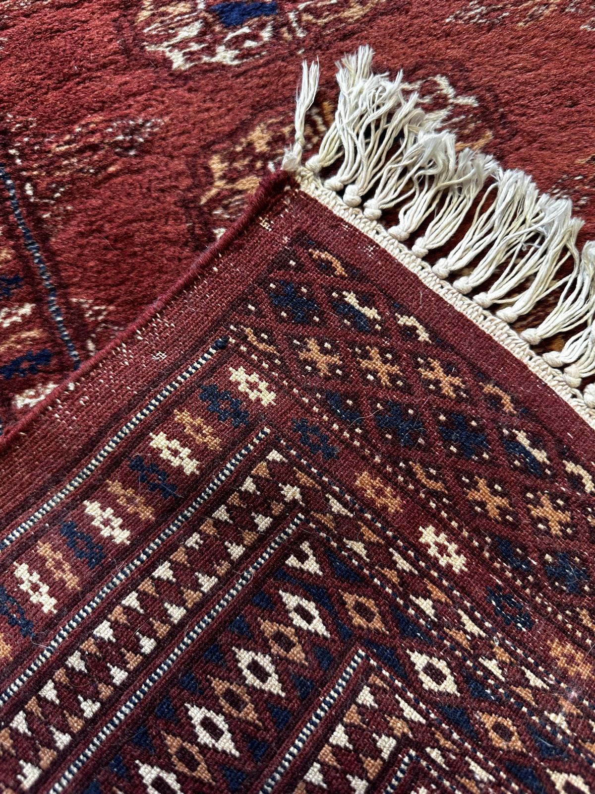 Handmade oriental hallway rug, 180cm x 70cm.