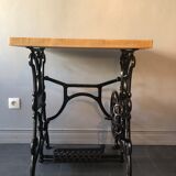 Ancient table, cast iron footing