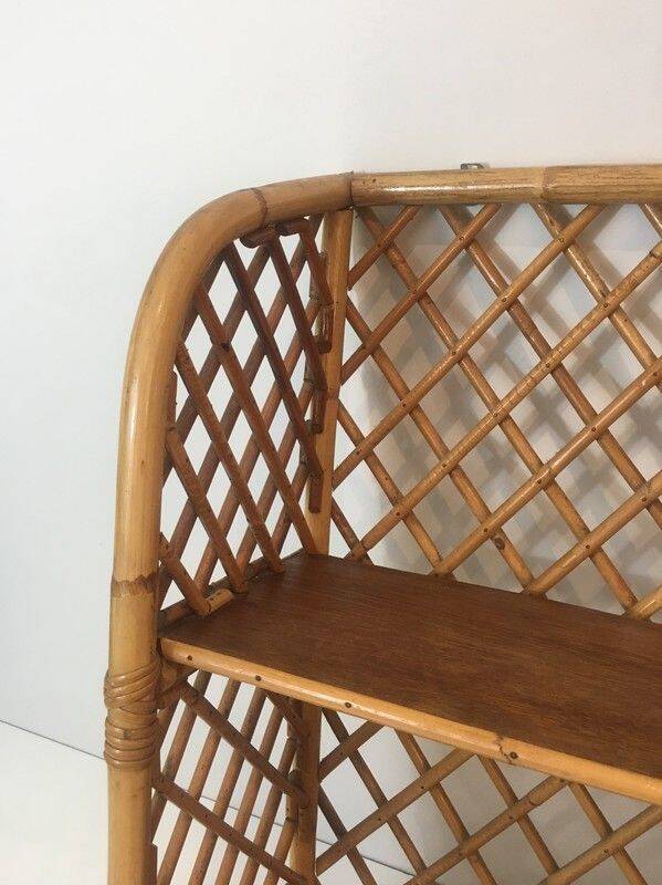 Rattan wall shelf. Attributed to Audoux-Minet